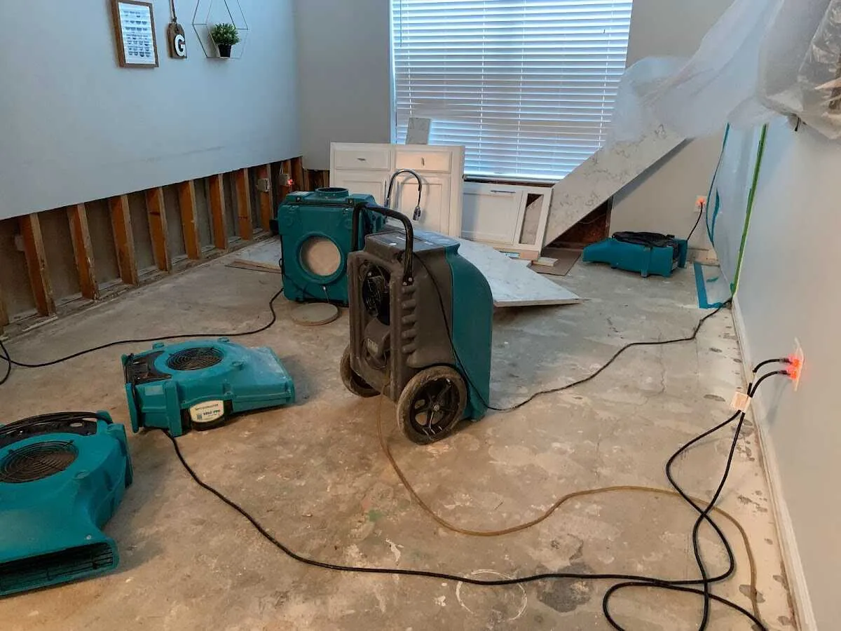 Dehumidifier in flood-cut room for Water Damage Restoration in Etowah